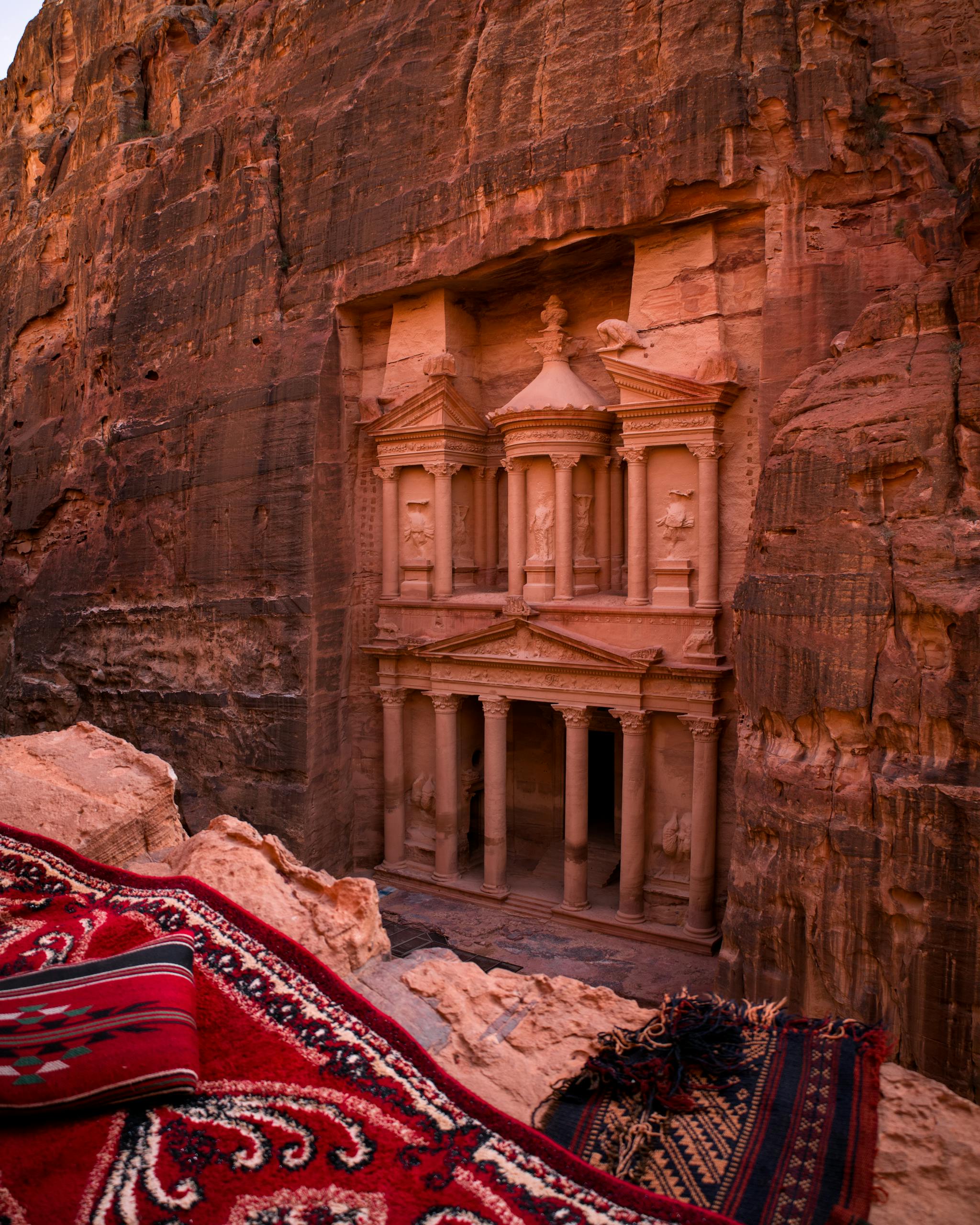 Explore the iconic Treasury at Petra, Jordan, carved into vibrant sandstone cliffs.